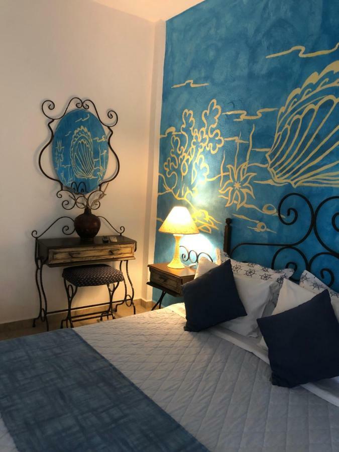 Thalassa Hotel Amoliani Bagian luar foto